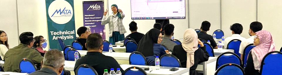"Malaysian Association for Technical Analysts member delivering educational talk to public students on financial markets and technical analysis